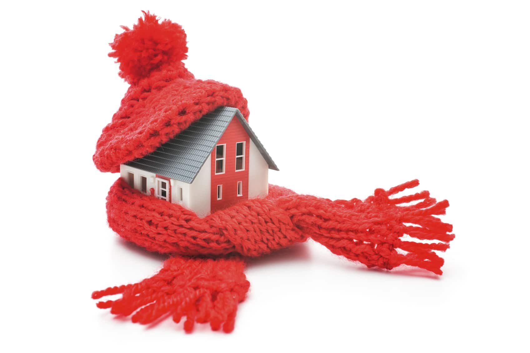 Tiny house wrapped in sweater and hat